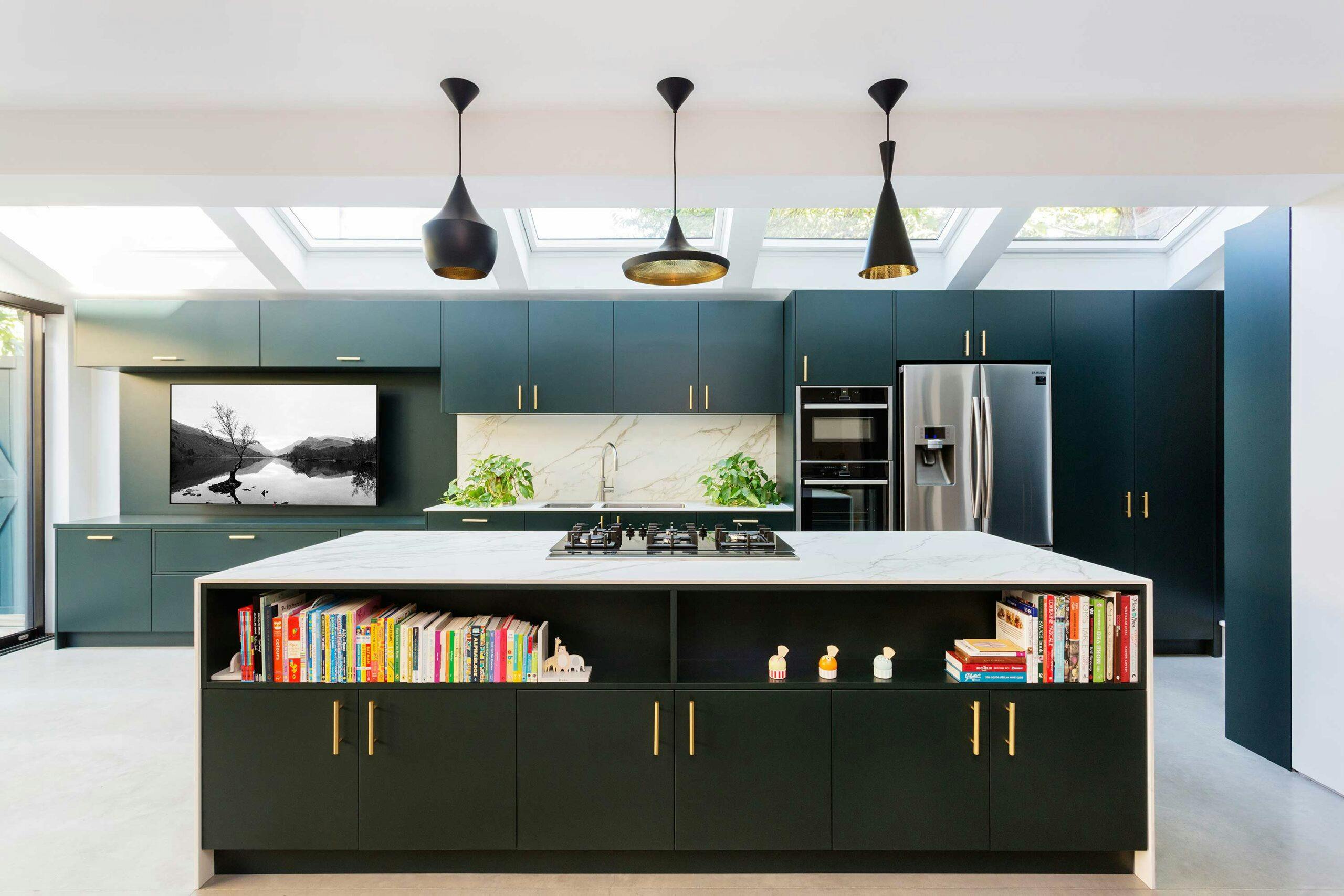 Deep green open plan kitchen in a Victorian Terrace exterior in West London | Design & Build Project by Zulufish