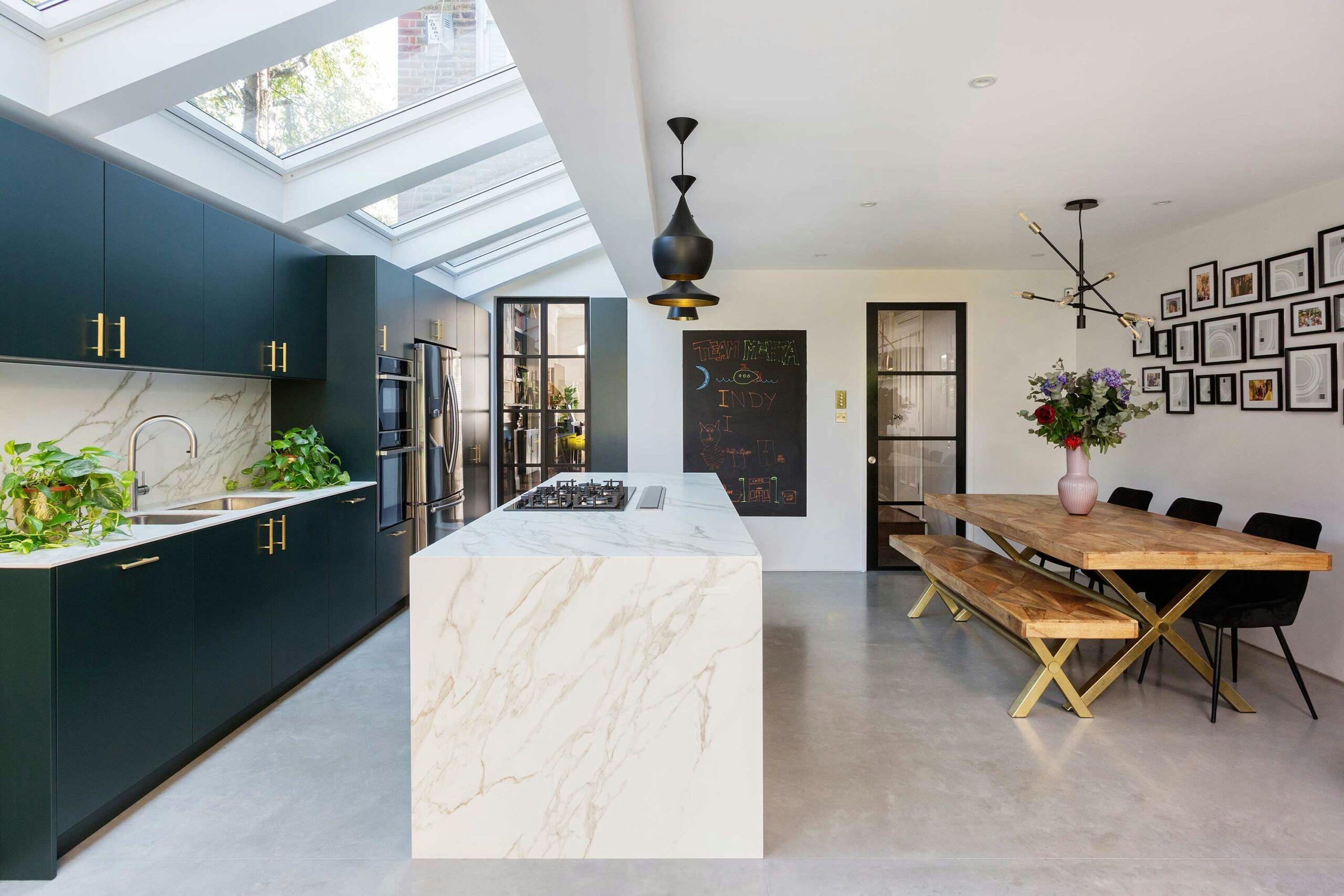 Deep green open plan kitchen extension and skylight in a Victorian Terrace exterior in West London | Design & Build Project by Zulufish